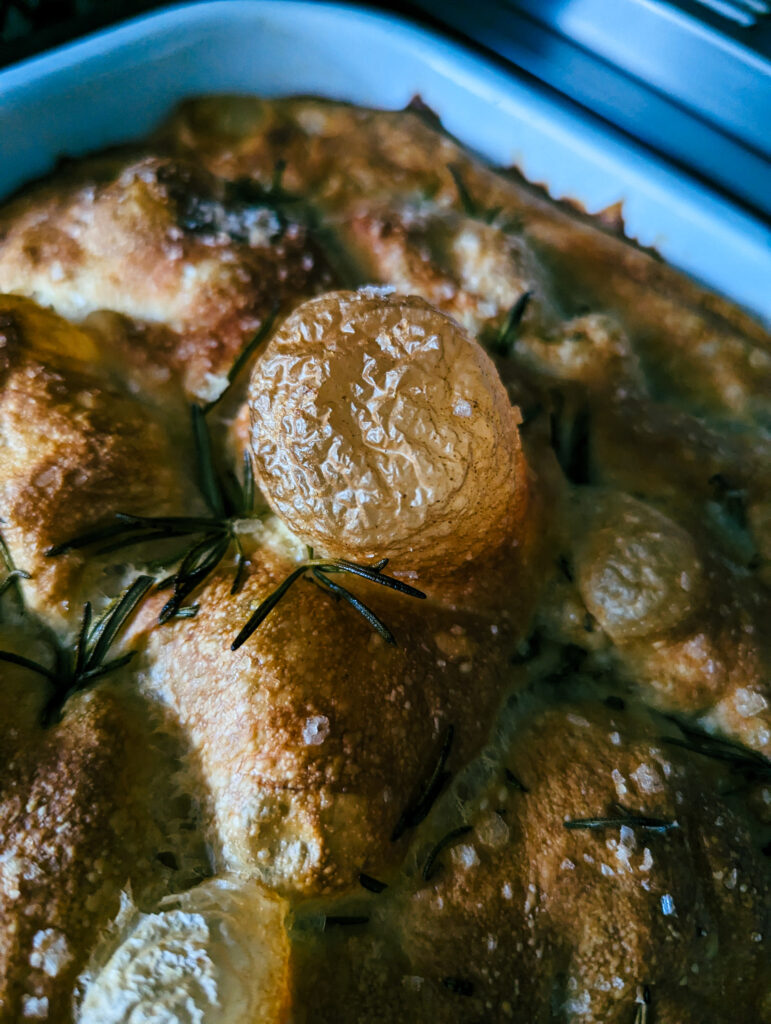 The golden bubbly crust of the perfect focaccia